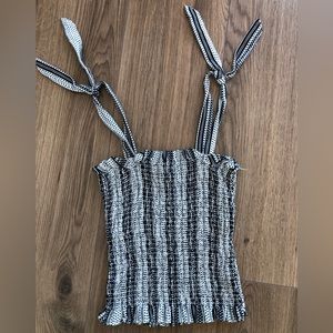 Black and white tank top with adjustable straps